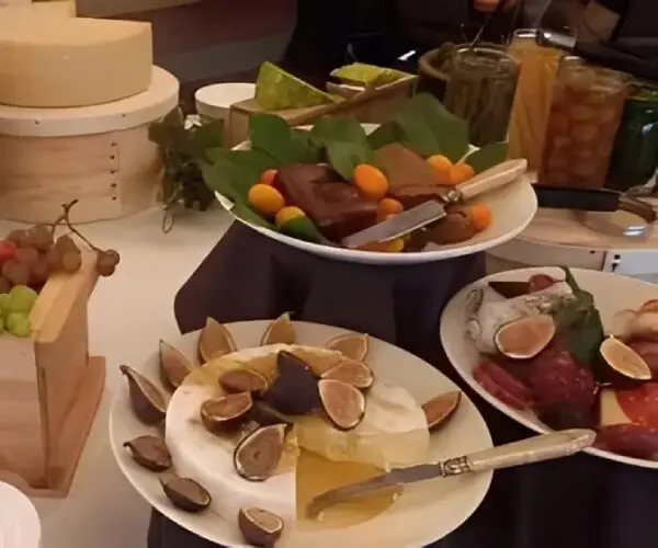 A table with various gourmet dishes and appetizers.